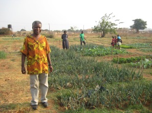 Pastor Francis and his garden that is used to feed the children attending the school